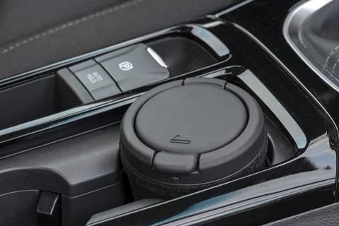 An ashtray on the console of a modern car Stock Photos