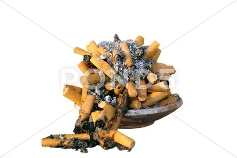 Ashtray full with cigarettes Stock Photos