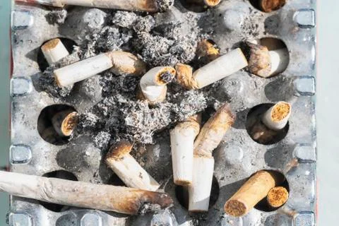 Ashtray full cigarettes Stock Photos