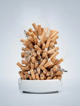 Ashtray full of cigarettes Stock Photos