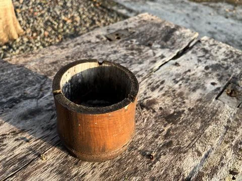 An ashtray made from bamboo on a table Stock Photos