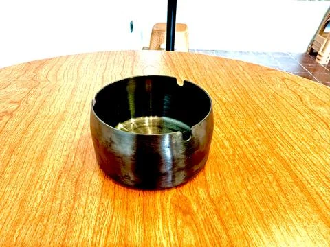 Ashtray on the table at Jakarta Stock Photos