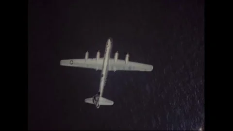 ASIA - 1945 - USAF B-29 bombers fly to Iwo Jima, where airmen begin construction Stock Footage 288011381