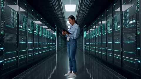 Asia Female Worker Is Feeling Headache While Use Tablet In Data Center Stock Footage 321990422