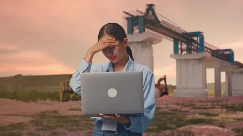 Asia Female Worker Headache When Use Laptop at Construction Site Stock Footage 330334699