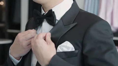 Asia groom try on suit at fitting room store ready for wedding day. Video stock 301374666