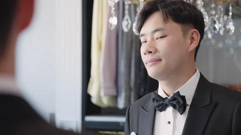 Asia groom try on suit at fitting room store ready for wedding day. Stock-Footage 301374754