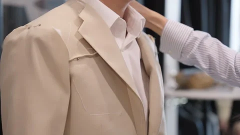Asia groom try on suit at fitting room store ready for wedding day. Video stock 301394132
