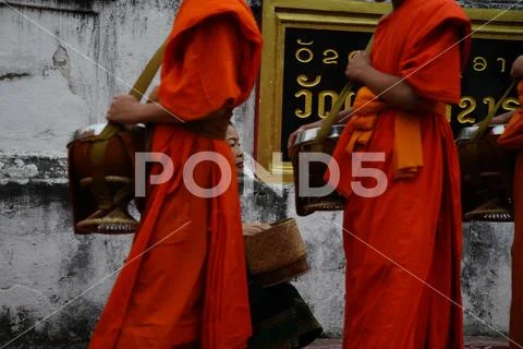 Asia Laos Luang Prabang Places of Worship Monks Receiving Alms Stock Photos