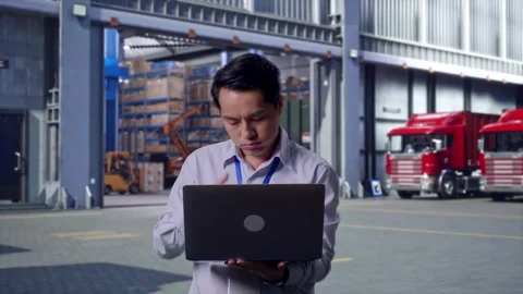 Asia Male Worker Is Feeling Failed, Outside Warehouse Stock Footage 295129183