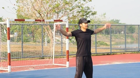 Asia Man Slow Motion Warm Up In Football Field.  Jumping Jack Before Training. Stock Footage 106935069