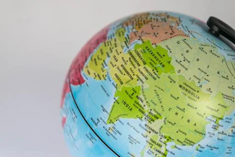 Asia map on a globe with white background. Stock Photos