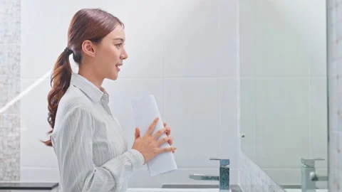 Asian applicant prepare for job interview in front of mirror at home. Stock Footage 171199053