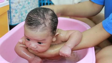 Asian baby Bathe Stock Footage