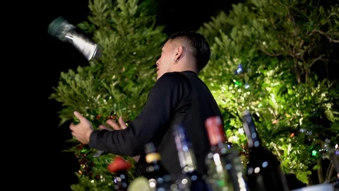 Asian barman is making cocktail at birthday night party. Stock Footage 123330153
