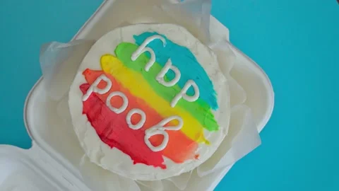 Asian bento cake rotation 360 degrees, white cake with good day inscription Stock Footage 201618106