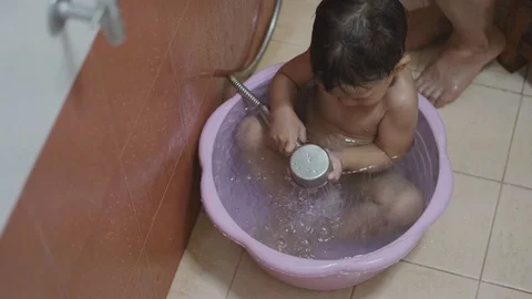 Asian boy being washed and showered by his mother Stock-Footage 86513562