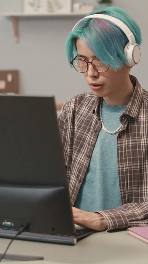 Asian Boy Developing Software on Computer in Office Stock Footage 241221863