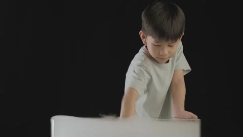 An Asian boy does an experiment with dry Ice. Video stock 202259961