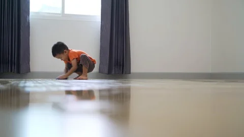 Asian boy doing chore Stock Footage 118238859