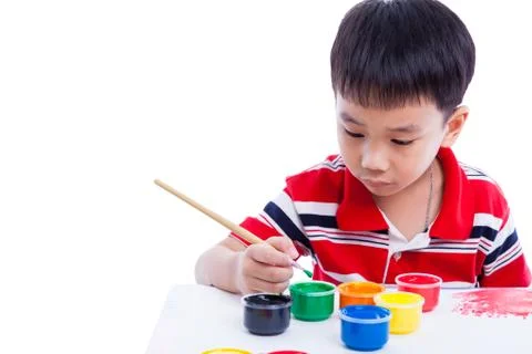 Asian boy draw image using drawing instruments, creativity concept, isolated Stock Photos