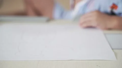 Asian boy drawing by using pencil as study at home Video stock 202259699