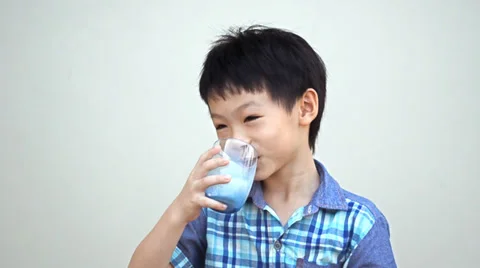 Asian boy drinking milk Stock Footage 37133411