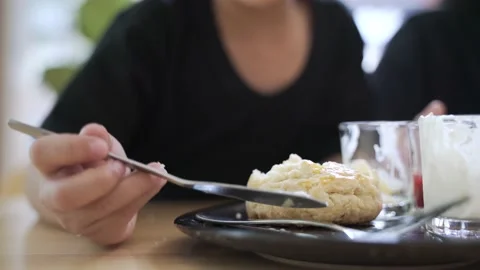 Asian boy eating scone Video stock 147336930