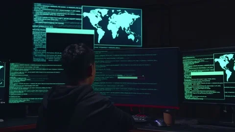Asian Boy Hacker Using Multiple Computer Hacking And Success Downloading Data Stock Footage 157328169