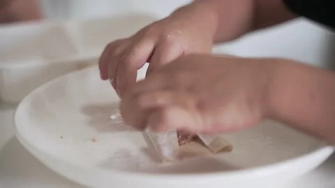 Asian boy hands folding simple dumpling wrappers Stock-Footage 187637128