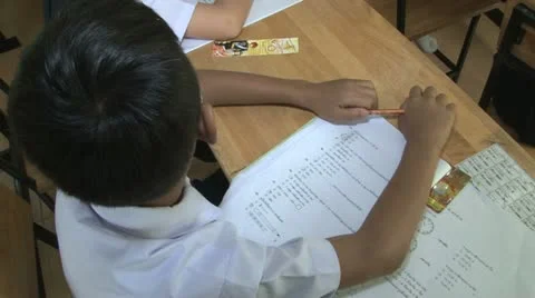 Asian Boy Listens In The Classroom 스톡 동영상 12550485
