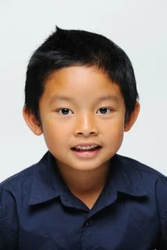 Asian boy looking at camera Stock Photos