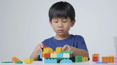 Asian boy playing with building block. Stock Footage 156603867