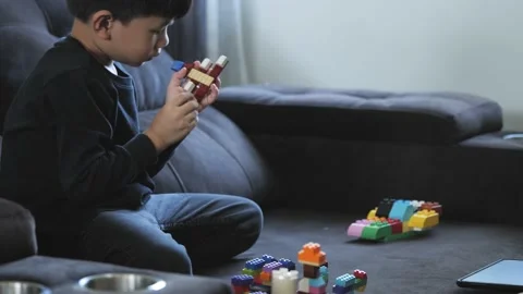 Asian boy playing with building block. Stock Footage 168852175
