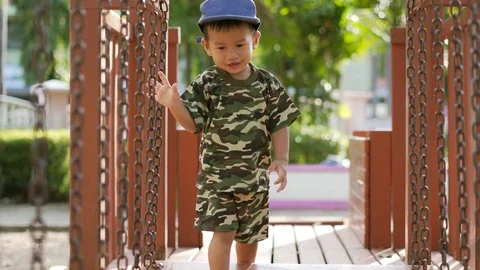Asian boy playing at kid training playground Video stock 86506493