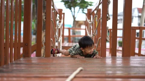 Asian boy playing at kid training playground Video stock 88632639