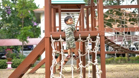 Asian boy playing at kid training playground Stock Footage 88632796