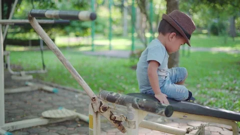 Asian boy playing at kid training playground Stock Footage 90411530