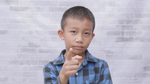 Asian boy pointing the finger Stock-Footage 116761805