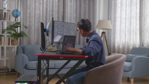 Asian Boy Programmer With A Tablet Creating Software Engineer Developing App Video stock 233460675