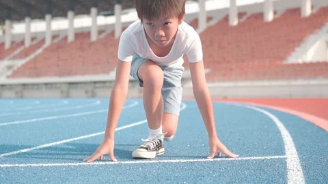 Asian boy running during summer time Stock Footage 107045033