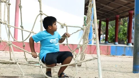 Asian boy sad alone Stock Footage 91006119