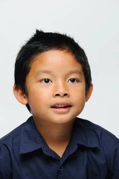Asian boy smiling at camera Stock Photos