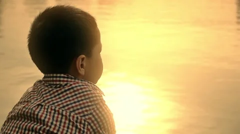 Asian boy smiling in sunset Stock Footage 50208170