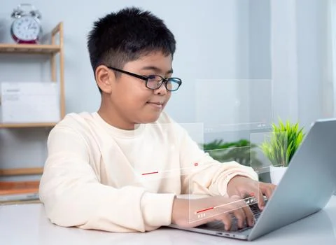 Asian boy student using computer laptop learning. Educational of tech conce.. Stock Photos