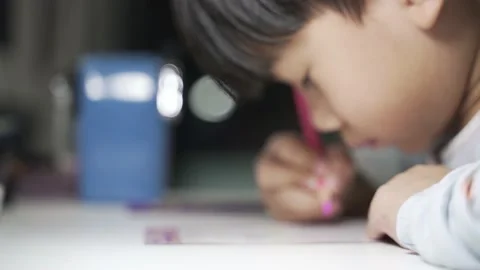 Asian boy study and writing English letters Stock Footage 204724246