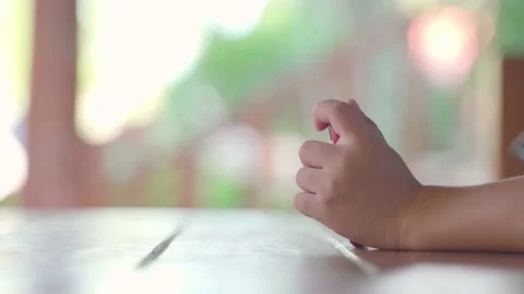 Asian boy using mobile phone for watching cartoon application Stock Footage 158286272