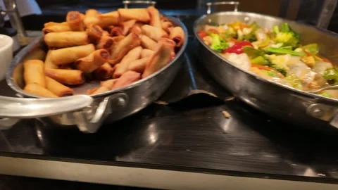 Asian Buffet Food on a Serving Table at Lunch Time Stock Footage 318005606