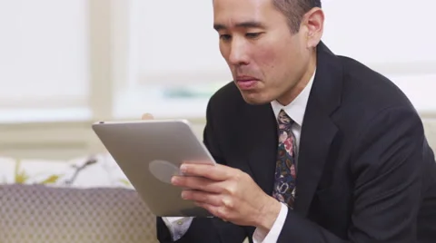 Asian business man using digital tablet Stock-Footage 62283884