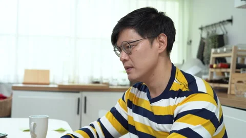 Asian business man using laptop Suffering From neck pain working at home of.. Stock Footage 252818544